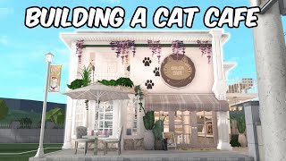 BUILDING A CAT CAFE IN MY BLOXBURG TOWN [upl. by Atirihs]