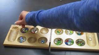 How to play Mancala [upl. by Dnalevelc]