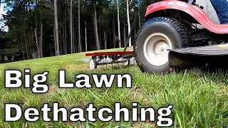 Dethatching With A Tow Behind Dethatcher  Fall Lawn Care  Part 1 of 5 [upl. by Adebayo]