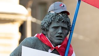 Protesters deface Terry Fox statue dance on war memorial [upl. by Yllak]