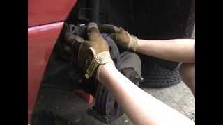 How to Inspect and Replace Front Disc Brake Pads on a Ford Windstar or Mercury Monterey Minivan [upl. by Vinaya]