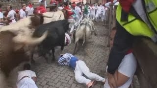 Pamplona festival Four hospitalised in Spains San Fermin bull run [upl. by Nwahsem]