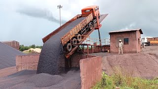 hydraulic truck tippler unloading iron ore pellets  ab heavy machines [upl. by Yorke]