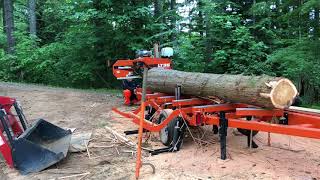 Sawing a cedar log for board formed concrete [upl. by Eelnodnarb151]