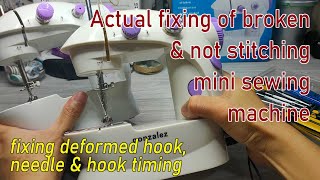 Actual fixing of broken and not stitching mini sewing machine  hook and needle alignment [upl. by Orofselet]