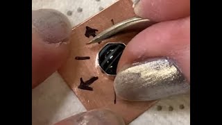 Setting a Cabochon Stone in a Bezel Cup Using a Burnishing Tool [upl. by Nnylrebma]