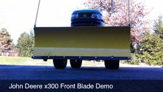 John Deere X300 Snow Blade Demo HD [upl. by Agripina876]