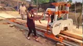 Norwood LumberMate LM29 Portable Band Sawmill milling lumber in Zambia [upl. by Eizdnil]