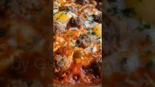 tagine Moroccan kofta eggs amptomato sauce cooking in traditional way [upl. by Nivled]