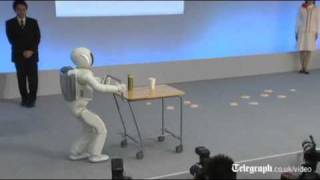 Hondas Asimo robot gets faster and smarter in human makeover [upl. by Eleumas733]