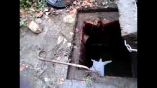 Lifting Heavy Concrete Lid with Come along to Clear Drain Part 3 [upl. by Litnahc]