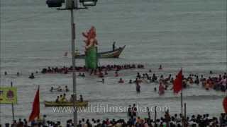 Devotees throng the beach on Ganpati Visarjan Mumbai [upl. by Peterman89]