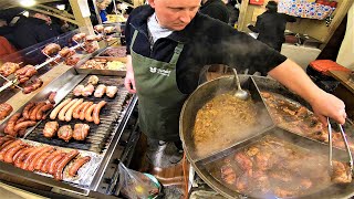 Street Food In Krakow Poland Huge Sausages and Pork Shanks Christmas Food Market [upl. by Harima]