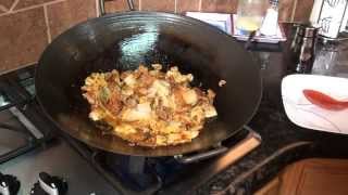 Wok Cooking Recipe Spicy StirFried Pork and Cabbage cooked in a cast iron wok [upl. by Nerak208]