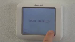 Fabrieksprogramma instellen Chronotherm Touch Modulation  Honeywell Home [upl. by Kara-Lynn]