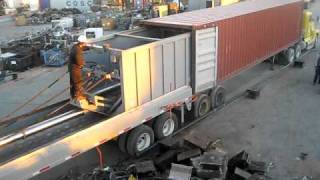 loading metal scrap in containers with machine video [upl. by Rae]