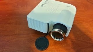 UC28 LED Mini Projector UNIC disassembly teardown [upl. by Jolda]