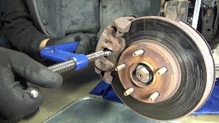 Front disc brake pads replacement 20012007 Ford Escape [upl. by Yuk]