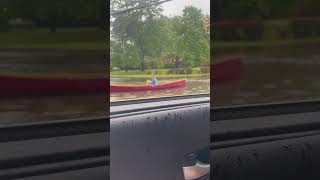 Man Kayaks on Flooded Street [upl. by Eelibuj]