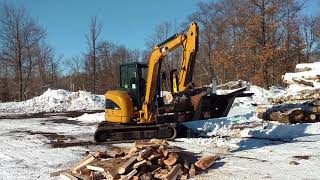 Halverson Firewood Processor on a MiniExcavator [upl. by Aven]