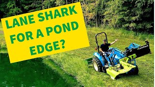 LANE SHARK Mowing A POND EDGE A front mounted Rotary Cutter on a Tractor [upl. by Schiffman630]