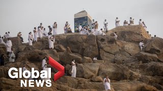 Haj Pilgrims scale Mount Arafat for sacred ritual in Mecca [upl. by Fast]