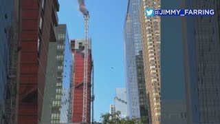 Big flames 9 civilians 2 firefighters injured in Manhattan crane fire collapse [upl. by Enywtna]