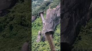 youtubeshorts train is crossing the cave in the jungle hills area trending shortvideo shorts [upl. by Lennod]