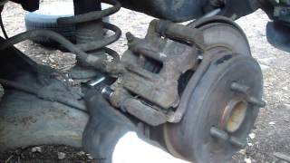 How to replace rear brake pads Toyota Corolla years 2001 to 2014 [upl. by Mary601]