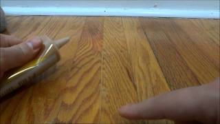 How To Fill In Gaps Between Hardwood Flooring With Wood Filler [upl. by Ocsicnarf971]