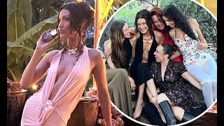 Bella Hadid exudes glamour in a plunging gown as she celebrates the launch of her new perfume [upl. by Effy324]