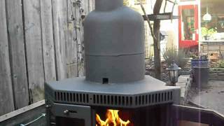 Finished converted wood stove to rocket stove heater [upl. by Lemrahs]