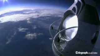 Daredevil skydiver Felix Baumgartner completes death defying leap from 18 miles up [upl. by Anuahsat]