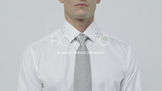 How To Tie A HalfWindsor Tie Knot  MR PORTER [upl. by Arlee845]