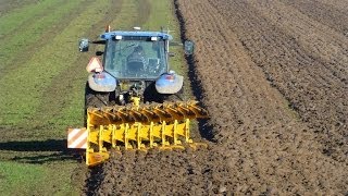 New Holland TM140 with 9 furrow Rumptstad WE9 ECOplough  ploeg [upl. by Maltz]