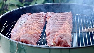 How to smoke BBQ ribs with the Slow N Sear and kettle  baby back or spareribs [upl. by Sherborne69]