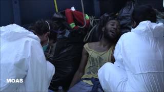 MOAS rescues 92 migrants from rubber dinghy [upl. by Akcinat855]