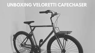 UNBOXING A COMMUTER BIKE VELORETTI CAFECHASER [upl. by Yelahs673]