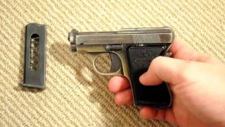 Basic fieldstrip of the Beretta 418 aka Bantam or Panther 25acp pocket pistol [upl. by Ennovad889]