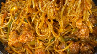 How to make The TASTIEST Jollof Spaghetti Full Recipe  UE Kitchen [upl. by Ahsataj]