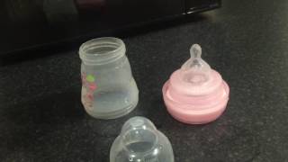 How To Sterilise Glass Bottle  How to sterilise bottles in boiling water [upl. by Ecnatsnok]