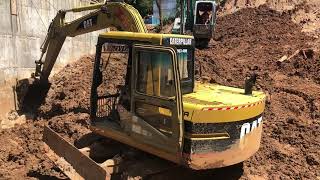 Two caterpillar machines today working and remove more wet soil for shoring and concrete wall [upl. by Nedgo]