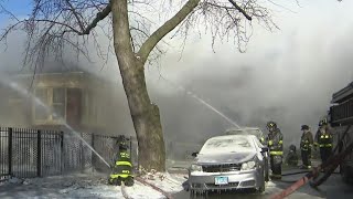 2 Chicago firefighters injured while fighting house fire in Grand Crossing [upl. by Tisbee]