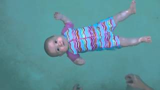 Baby swimming  floating unassisted at 5 months old [upl. by Eenor403]