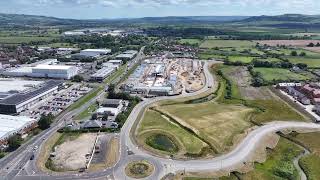 Drone flight over the construction site at Cotswolds Designer Outlet June 2024 [upl. by Dinse]