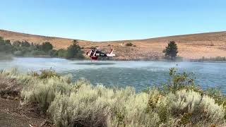 Helicopter scoops water from French Canyon Reservoir to fight Retreat Fire [upl. by Dweck]