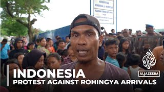 Rohingya refugees in Indonesia Locals protest against Rohingya arrivals [upl. by Ayerdna]