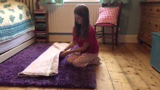 How to Fold a Quillow  Natural Quilts [upl. by Yatnwahs]