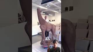 Chocolate Giraffe 🦒 This 83ft tall 100 chocolate sculpture is my biggest creation yet [upl. by Oynotna]