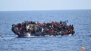 Migrant boat capsize off Libyan coast caught on camera [upl. by Esmerolda701]